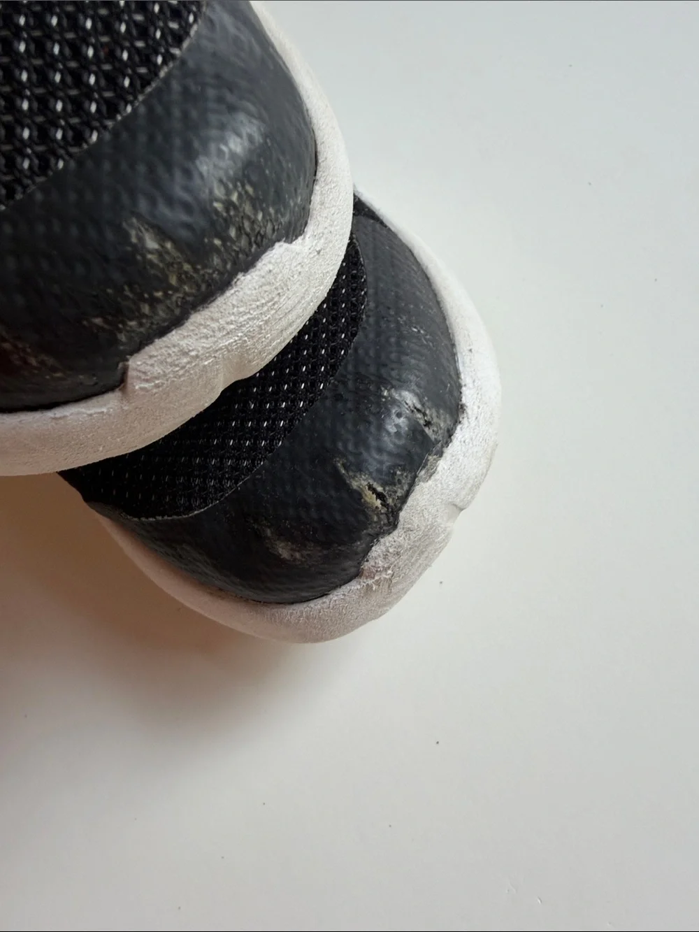 Under Armour Black and White Kids' Athletic Sneakers with Gold Logo